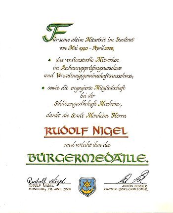 Rudolf Nigel Bürgermedaille Verleihung am 29. April 2008 Urkunde für Rudolf Nigel zur Verleihung der Bürgermedaille der Stadt Monheim, datiert am 29. April 2008.