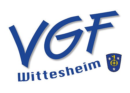 Logo VFG Wittesheim_10.03.2025 Logo mit blauen Großbuchstaben „VGF“ und darunter „Wittesheim“ rechts ein blaues Wappen mit gelbem Schlüssel und drei weißen Sternen auf weißem Hintergrund.